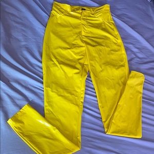 Thee yellow LATEX pants.